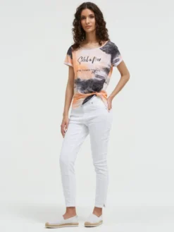 Ausbrenner-Shirt mit All Over Print und Knotensaum neon apricot