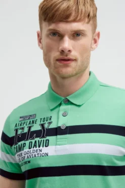 Kurzarmpolo mit Streifen-Design und Artworks flight green