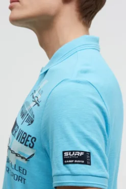 Pikee-Polo mit Artworks und Puffprint-Details aqua