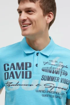 Pikee-Polo mit Artworks und Puffprint-Details aqua