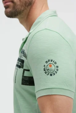 Polo aus Flammgarn-Pikee mit Artworks light mint