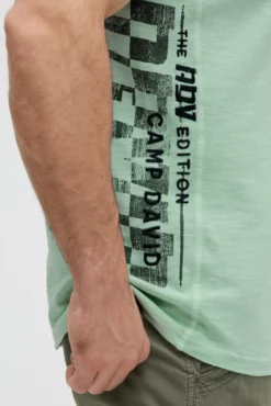 Polo aus Flammgarn-Pikee mit Artworks light mint