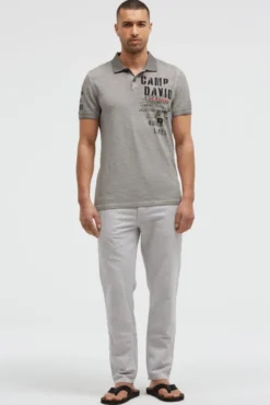 Polo mit Streifenstruktur und Label Prints shadow
