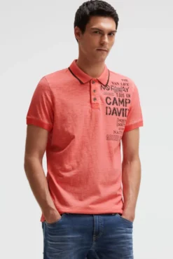 Poloshirt mit Vintage Prints wild salmon
